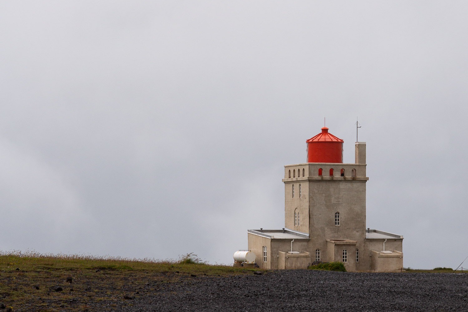 Dyrholaey lighthouse with storm clouds